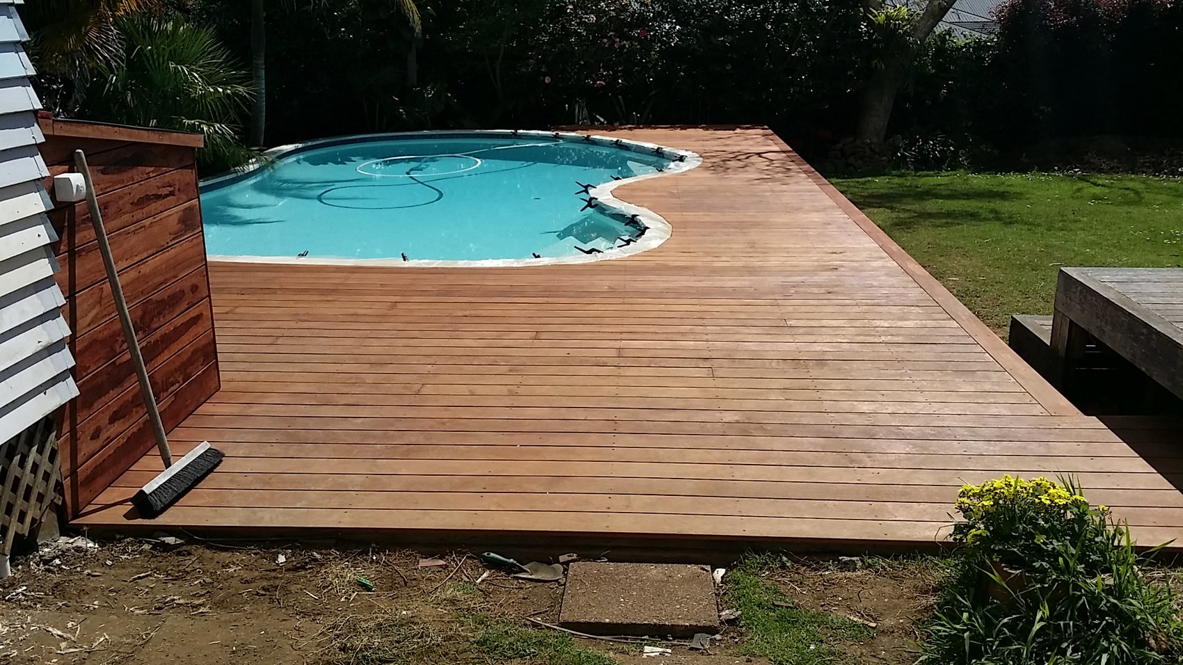 Finished timber pool deck built by True Carpentry in Auckland